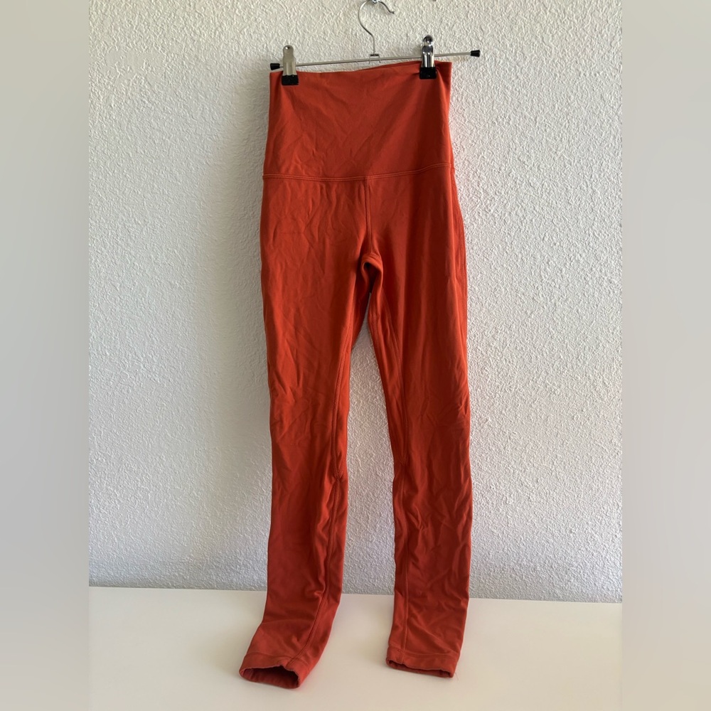 Lululemon leggings in burnt orange color size 4